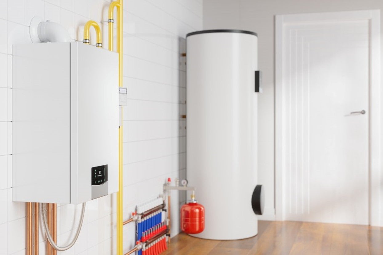 A white water heater installed by Hydro-Flo Plumbing & Heating in Edmonton, AB