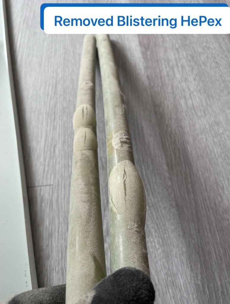 Comparison of intact and blistered HePex piping in high-rise hydronic heating system